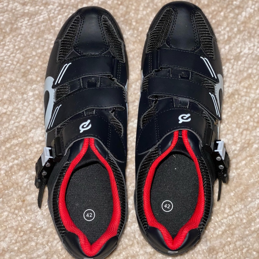 Cycling Shoes with a breathable upper and mesh vent on the base.